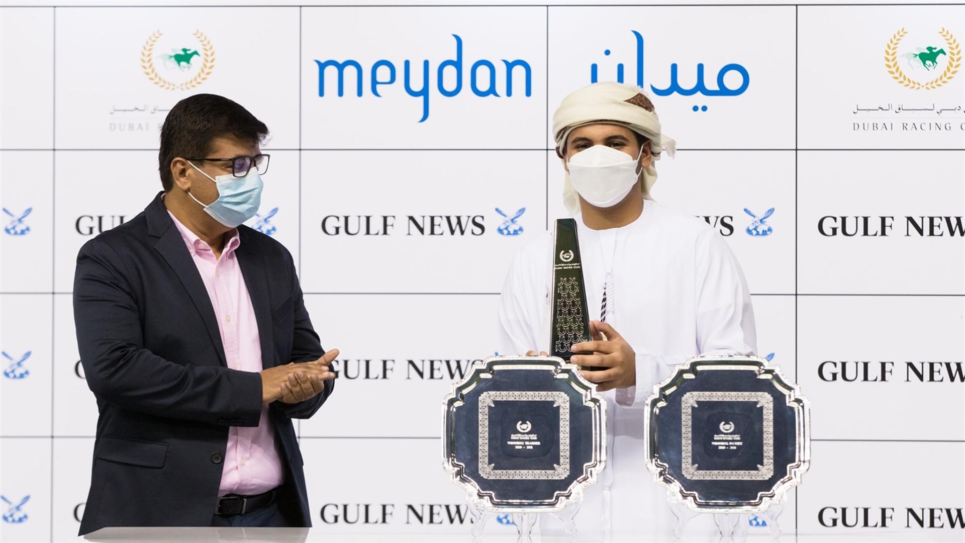 Tahnoon Alalawi, Helal Alalawi and Patrick Cosgrave accept the trophies for the Gulf News from Mr. Bobby Naqvi, Print Editor, Gulf News, on January 30, 2021. (Credit: DRC // Erika Rasmussen)