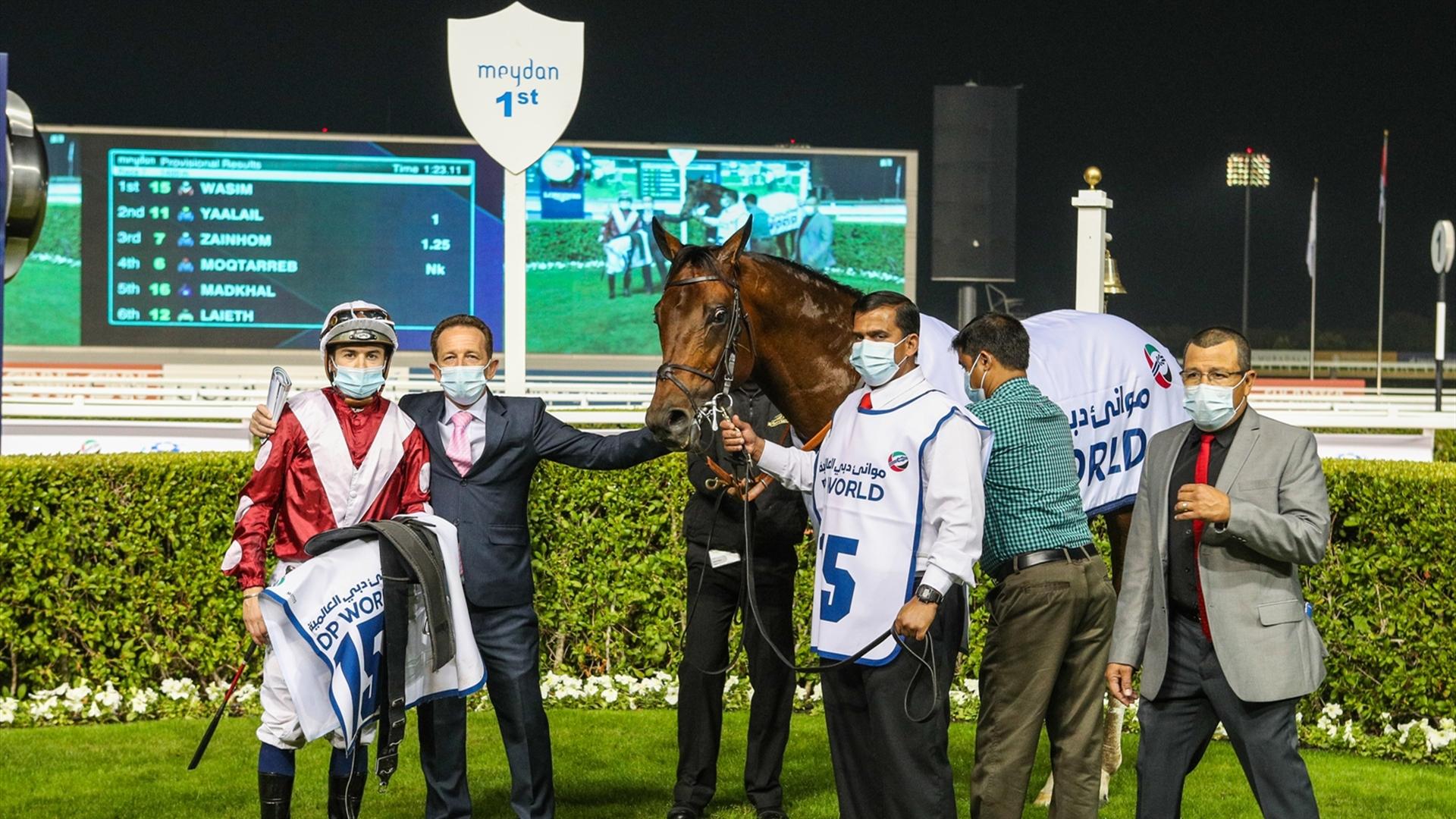 Wasim (IRE) (FR) (Ismail Mohammed - Mickael Barzalona) wins the Mina Rashid 1400m, Handicap at the sixth Racing at Meydan meeting on January 14, 2021. (Credit: Dubai Racing Club)