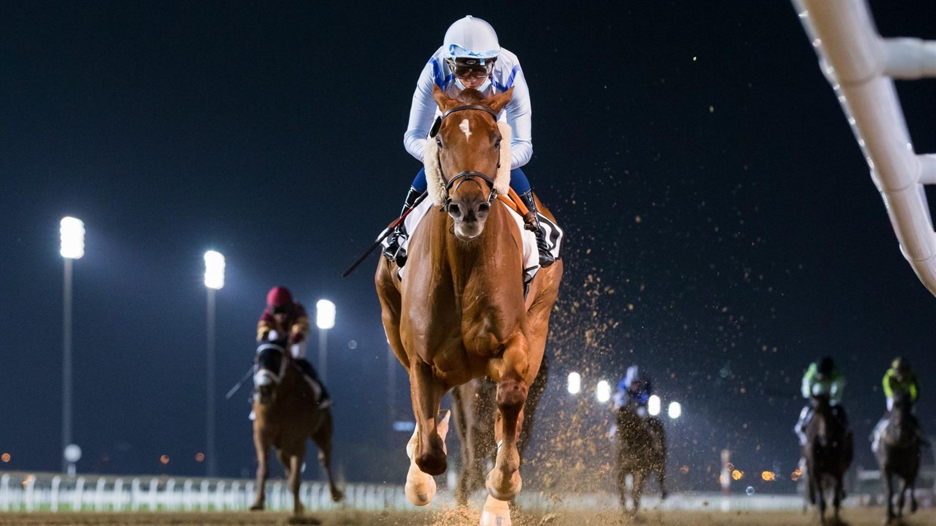 Book Review (GB) (Salem bin Ghadayer - Mickael Barzalona) wins the REACH by Gulf News - 2200m, handicap race at the eighth Racing at Meydan meeting on January 30, 2021. (Credit: Erika Rasmussen//DRC))