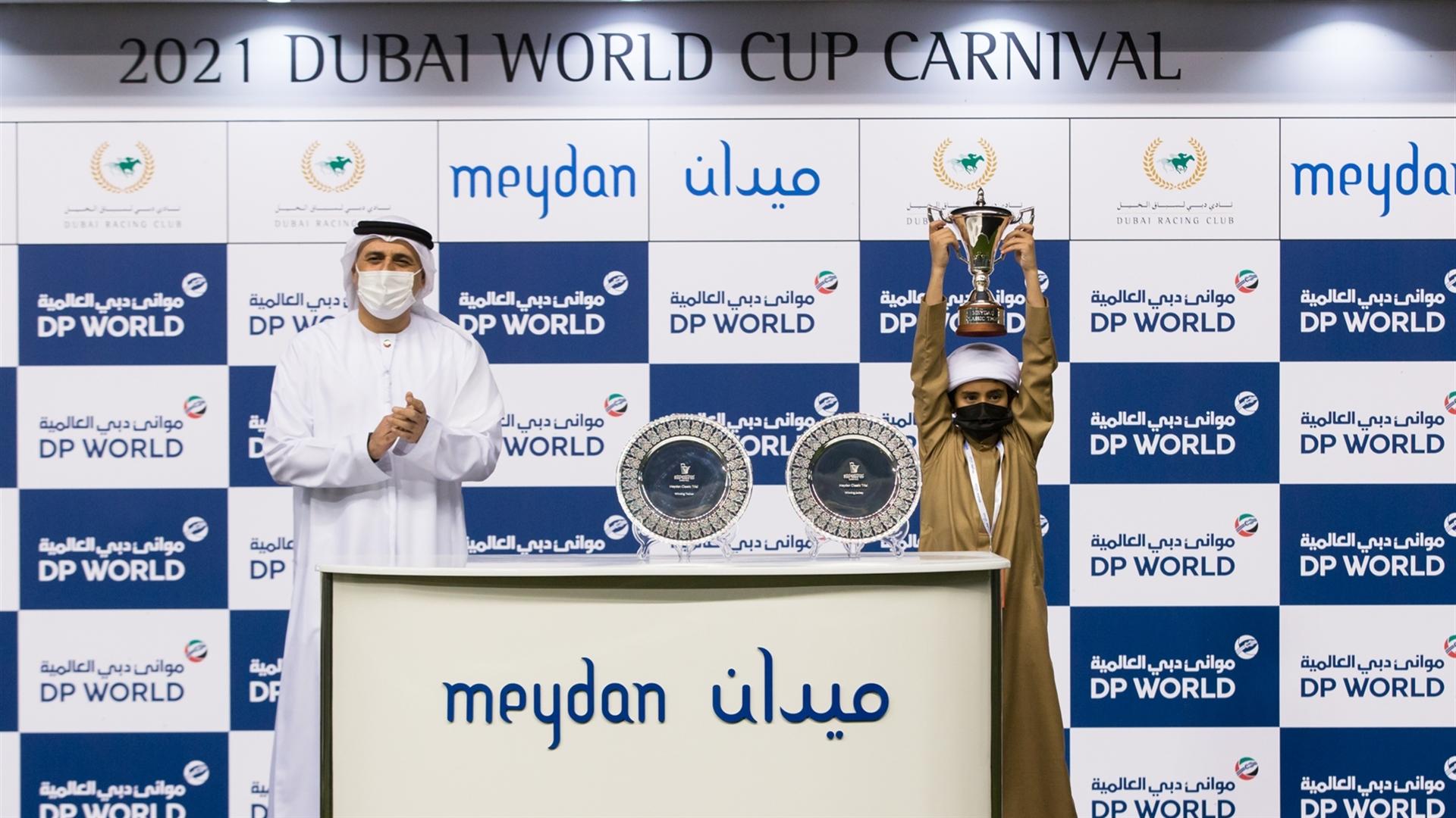 Faizal Al Shafar accepts the trophy for the Meydan Classic Trial Sponsored By Jebel Ali Port on February 4, 2021. (Credit: Erika Rasmussen//DRC)