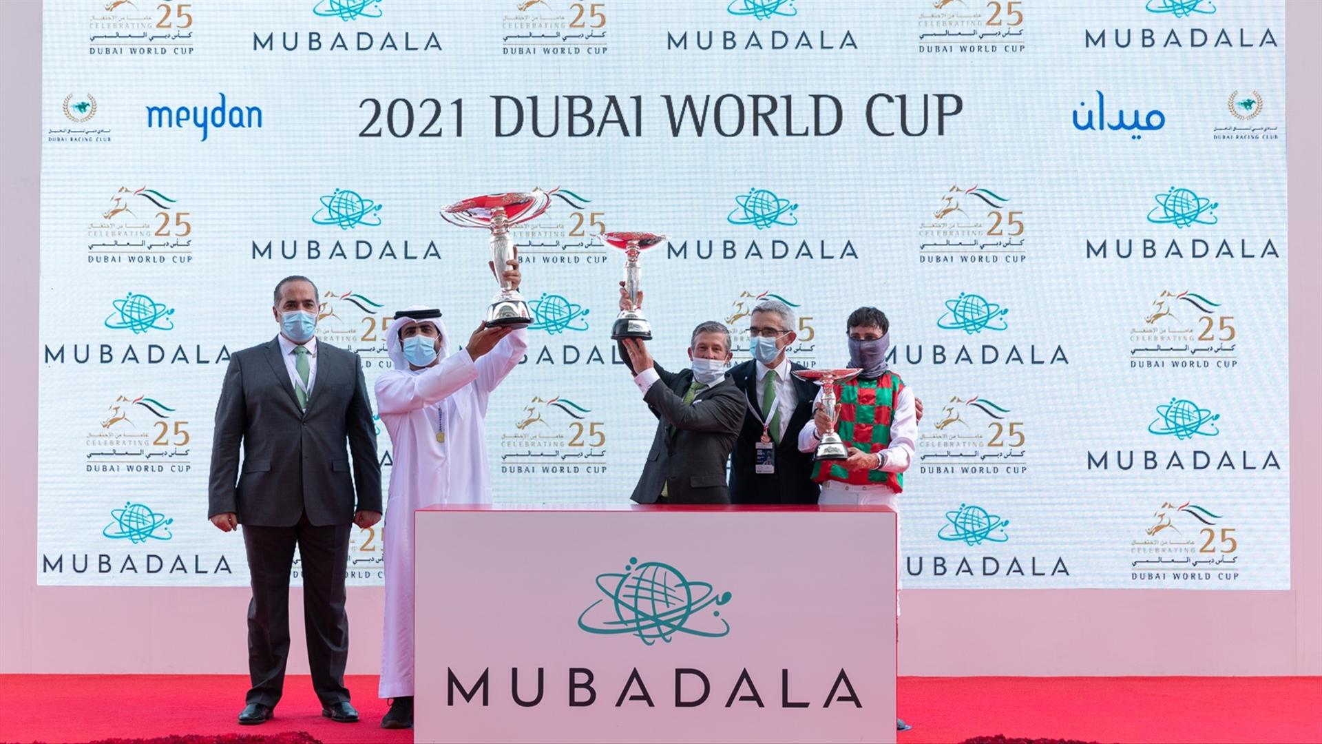 H.E Abdalla Al Marar, Didier Guillemin and Ioritz Mendizabal accept the trophies for the Dubai Kahayla Classic Sponsored By Mubadala (Credit Dubai Racing Club // Neville Hopwood)