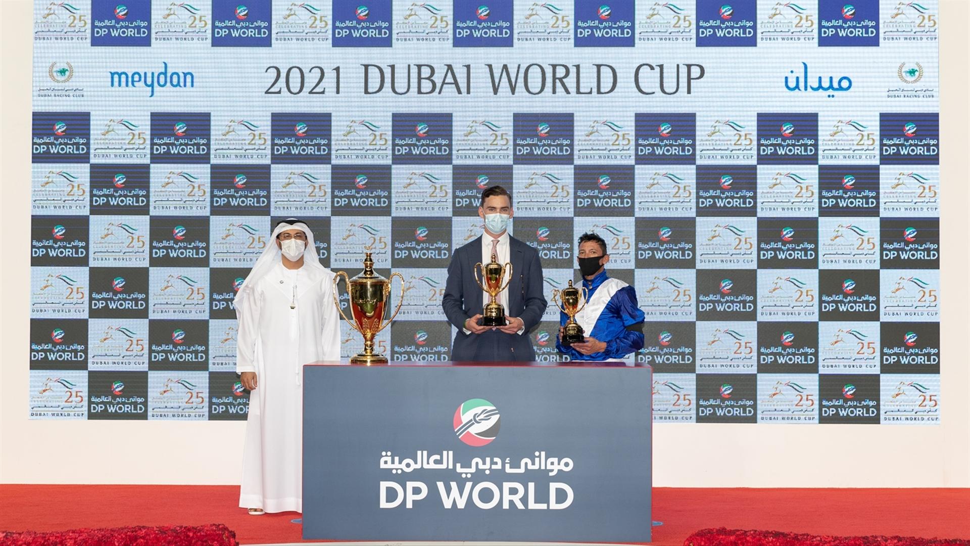 Lord North (IRE) (John Gosden - Lanfranco Dettori) wins the Dubai Turf Sponsored by Emirates NBD at the Dubai World Cup 2021, Saturday, 27th March, 21 (Credit Dubai Racing Club // Neville Hopwood)