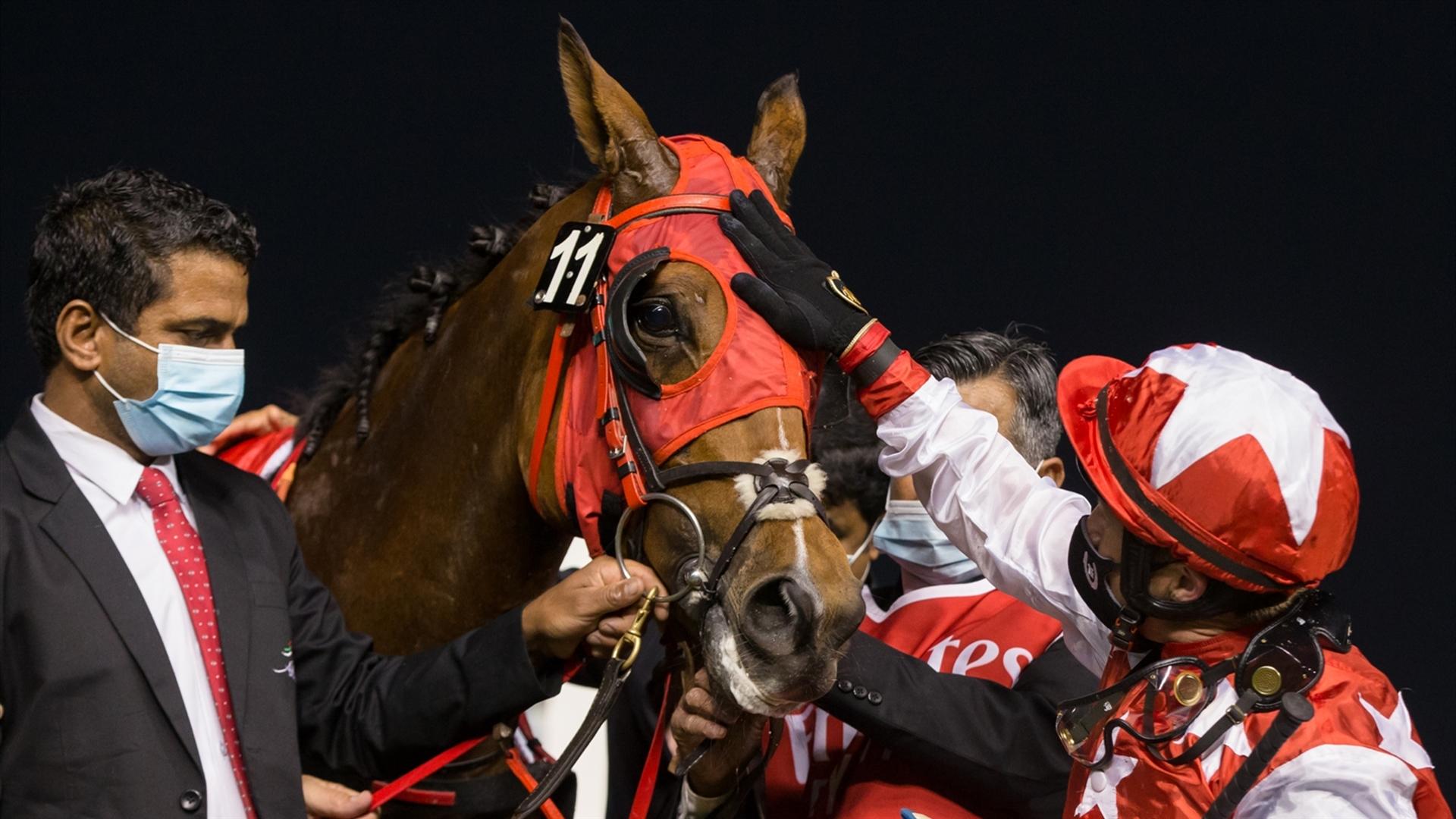 RB Money To Burn (US)(Eric Lemartinel - Tadhg O'Shea) wins the Mazrat Al Ruwayah Sponsored By Arabian Adventures at the fourth DWCC on February 11, 2021. (Credit: Erika Rasmussen//DRC))