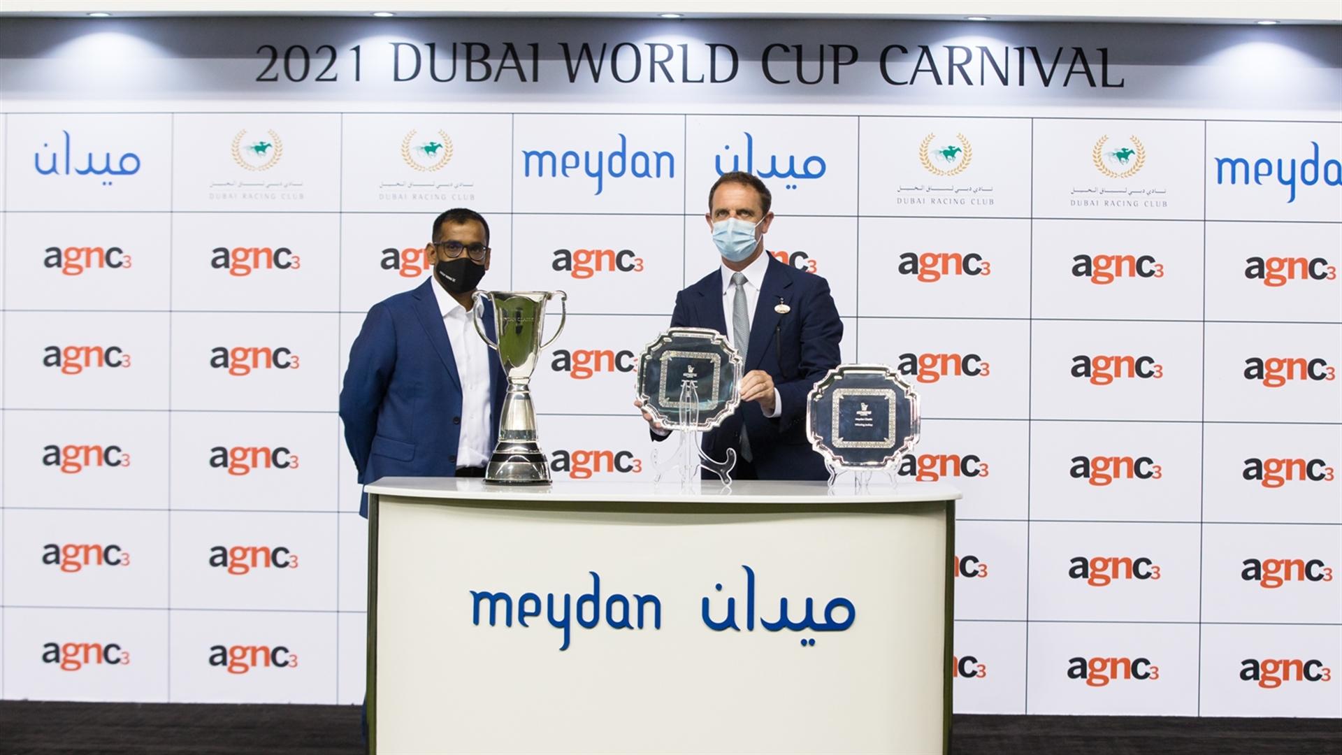 Charlie Appleby accepts the trophy for the Meydan Classic Sponsored By agnc3, Listed race, David George, Publisher on February 25, 2021. (Credit: Erika Rasmussen//Dubai Racing Club)
