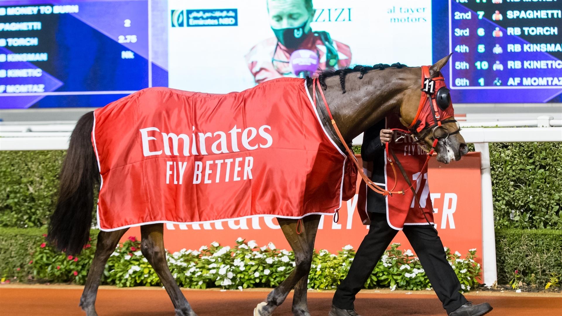 RB Money To Burn (US)(Eric Lemartinel - Tadhg O'Shea) wins the Mazrat Al Ruwayah Sponsored By Arabian Adventures at the fourth DWCC on February 11, 2021. (Credit: Erika Rasmussen//DRC))