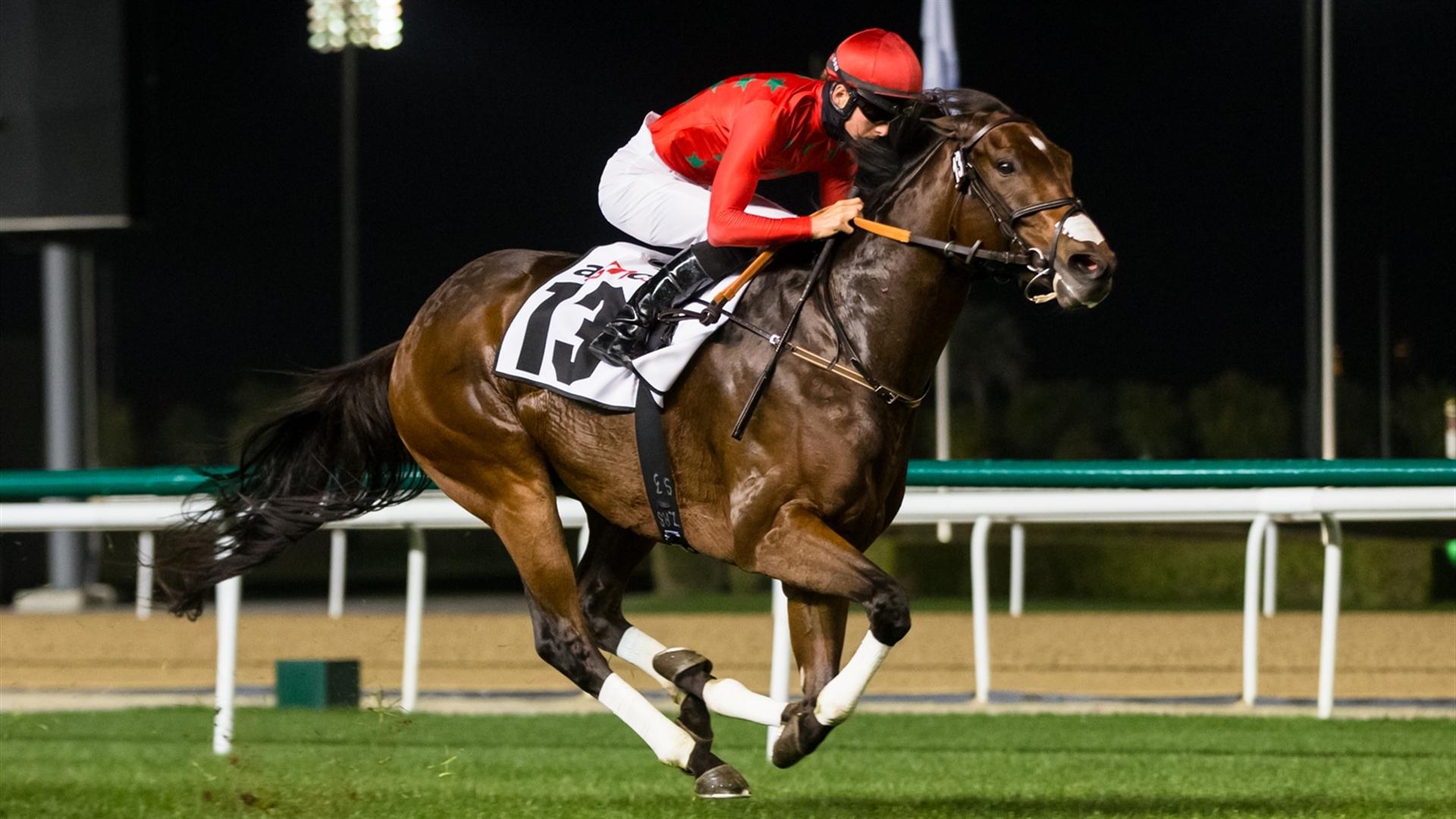 Moshaher (USA) (Satish Seemar - Harry Bentley) wins the Agnc3 - 1000m, turf, handicap race at the eighth Racing at Meydan meeting on January 30, 2021. (Credit: Dubai Racing Club // Erika Rasmussen)