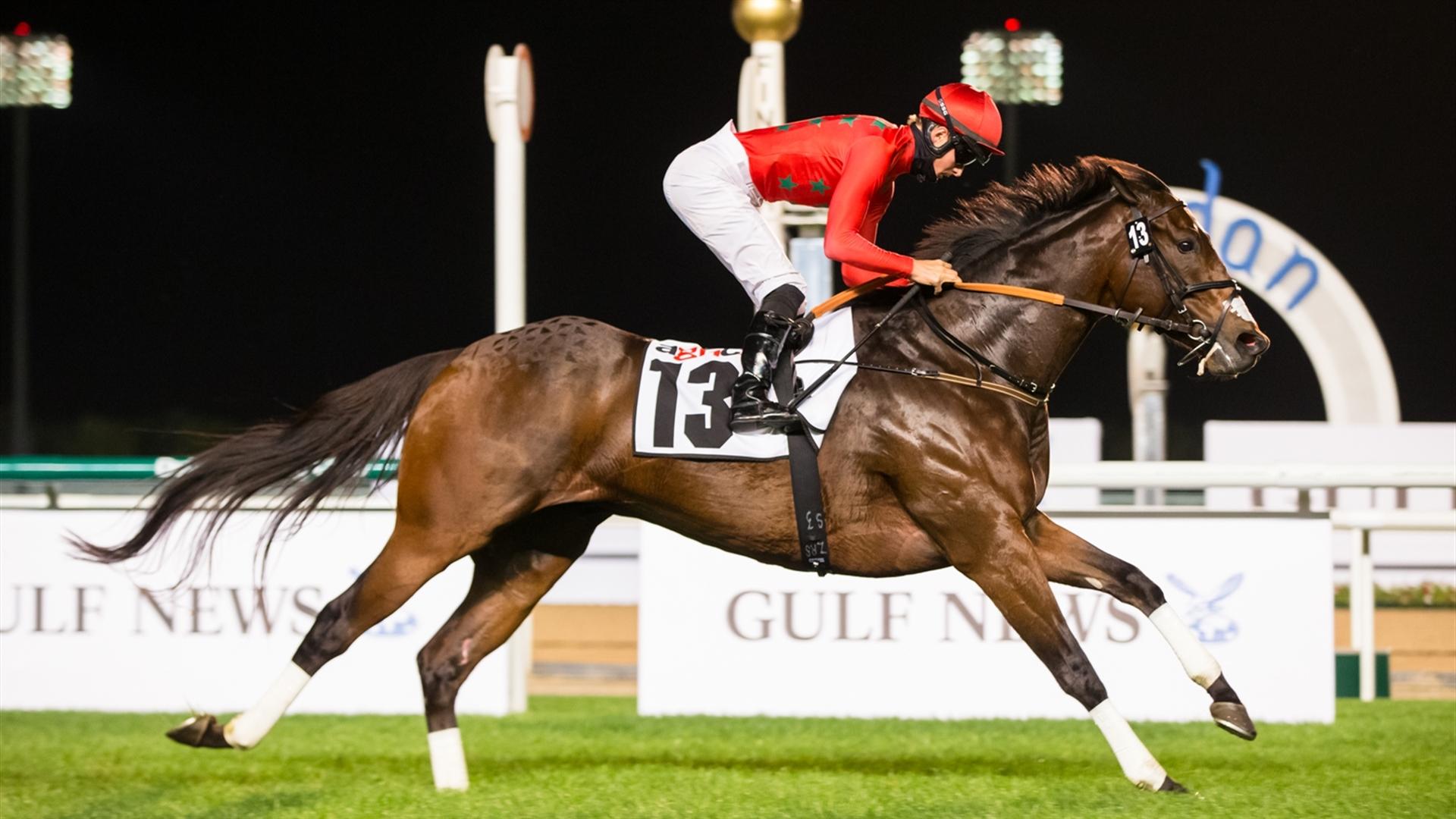 Moshaher (USA) (Satish Seemar - Harry Bentley) wins the Agnc3 - 1000m, turf, handicap race at the eighth Racing at Meydan meeting on January 30, 2021. (Credit: Dubai Racing Club // Erika Rasmussen)