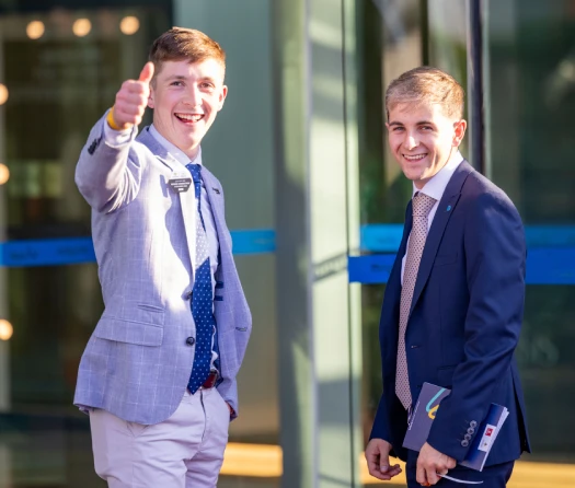 Happy racegoers with winning tickets