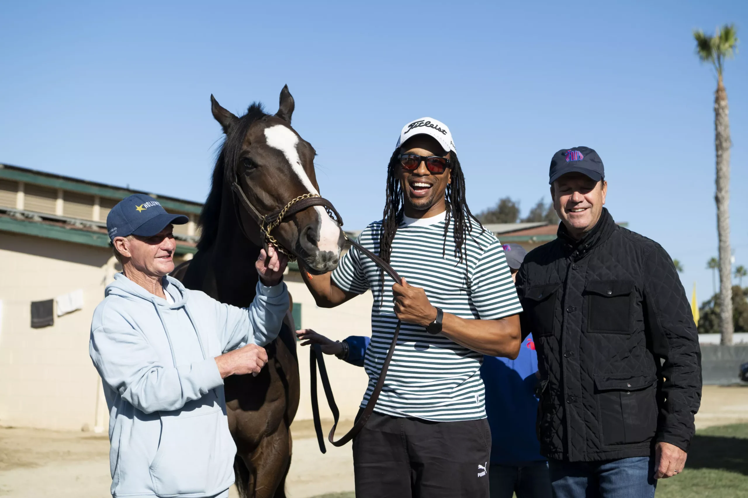 Peter Muscutt, Odwa Ndungane and Graham Motion with Isivunguvungu at the 2024 Breeders' Cup in Del Mar, California. (Carlos J. Calo/Eclipse Sportswire/Breeders Cup)