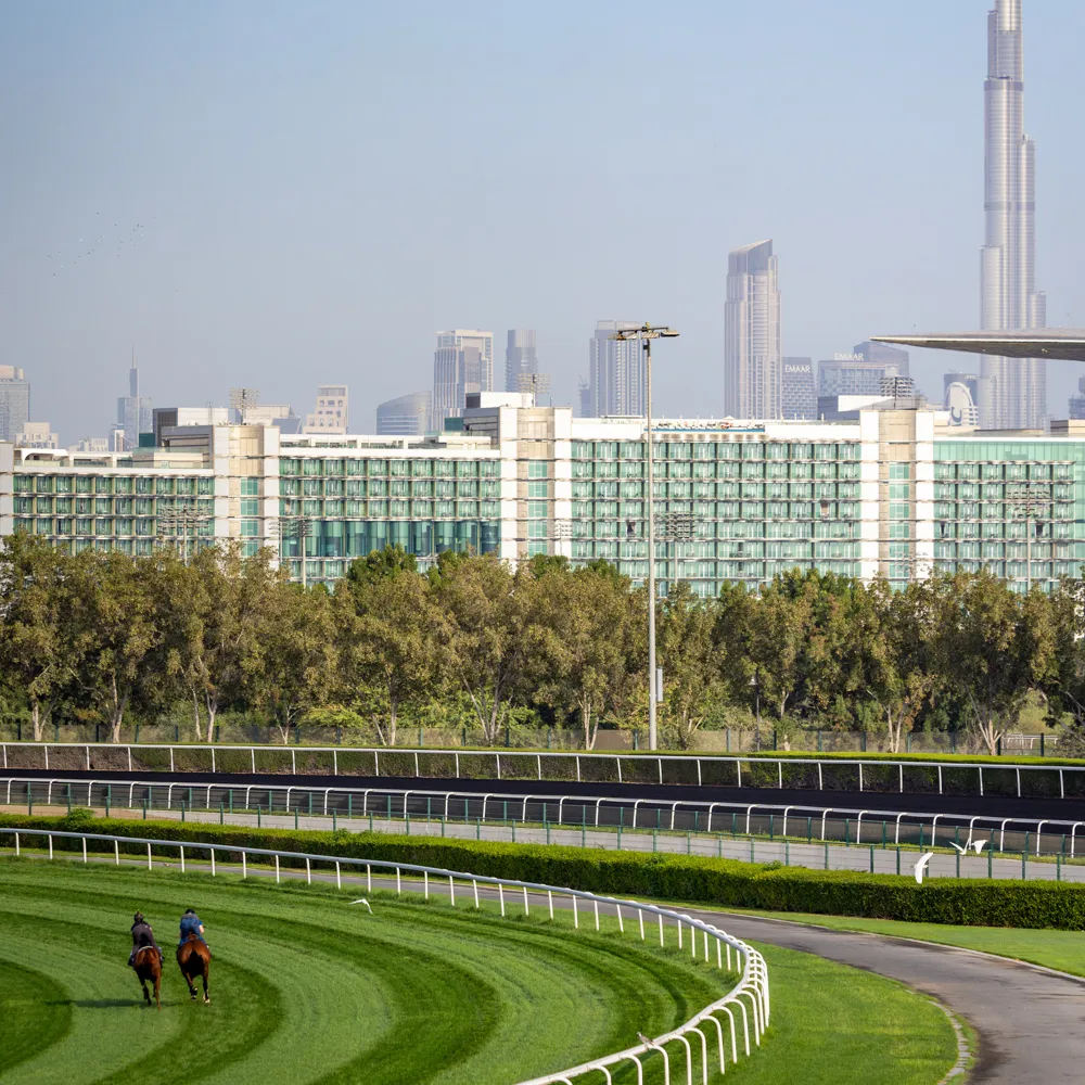 Track view with Dubai skyline backdrop