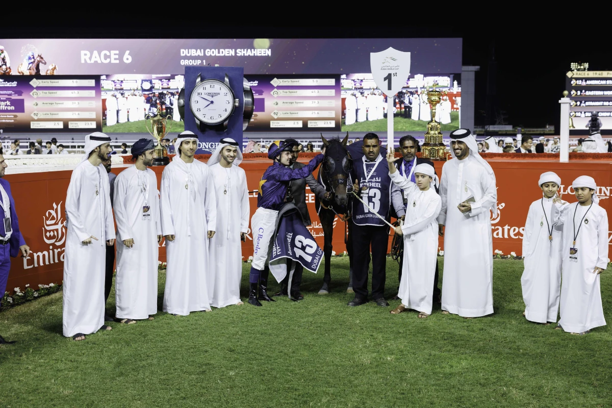 Race day officials with championship trophy