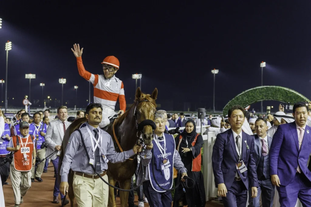 Champion jockey celebrating race victory
