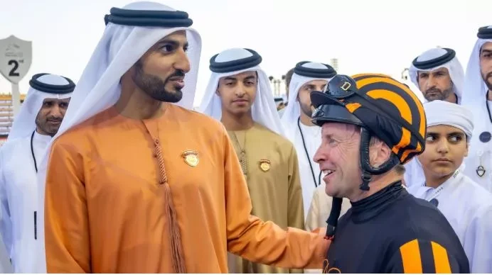 Sheikh Mohammed with winning jockey