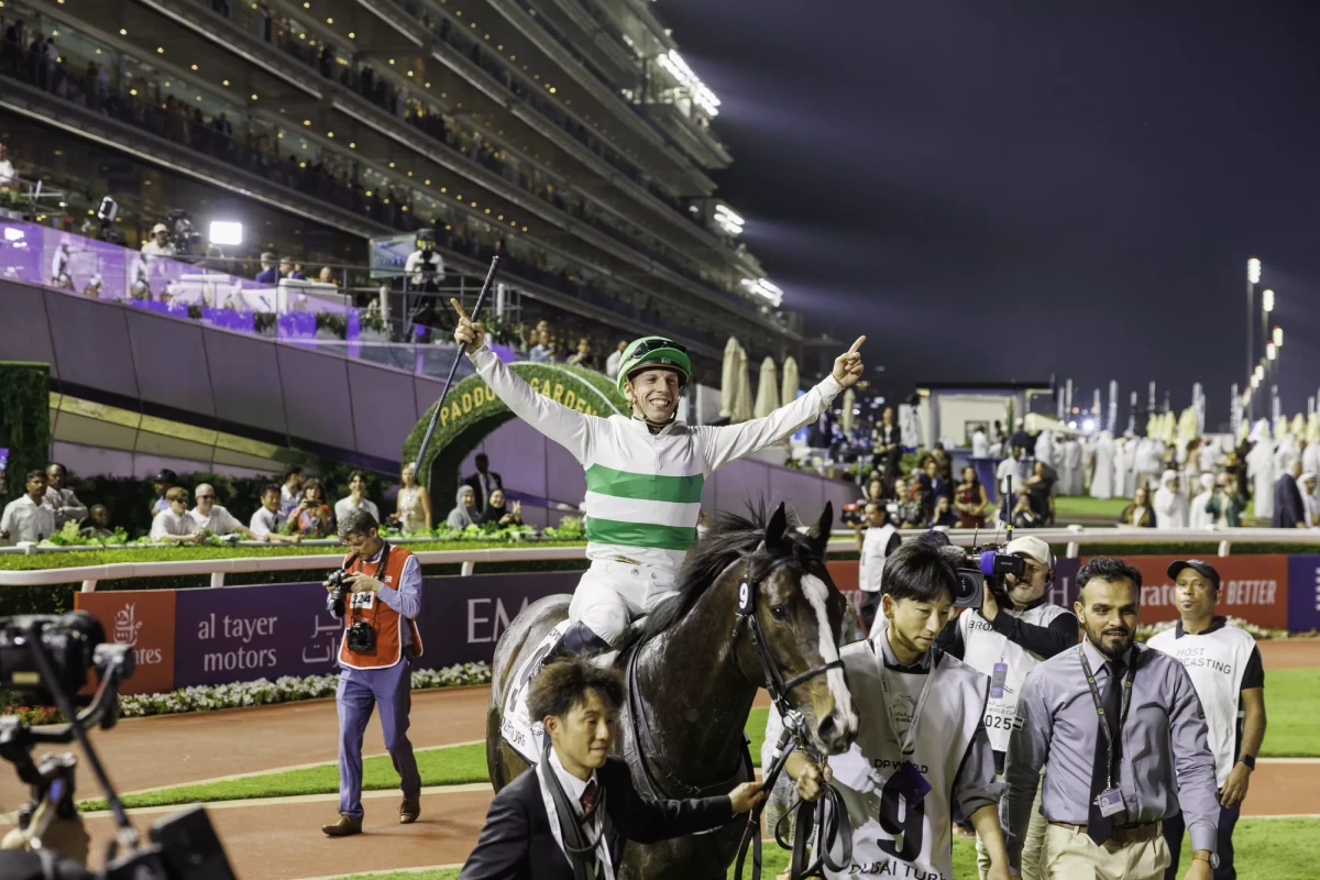 Champion jockey celebrating race victory