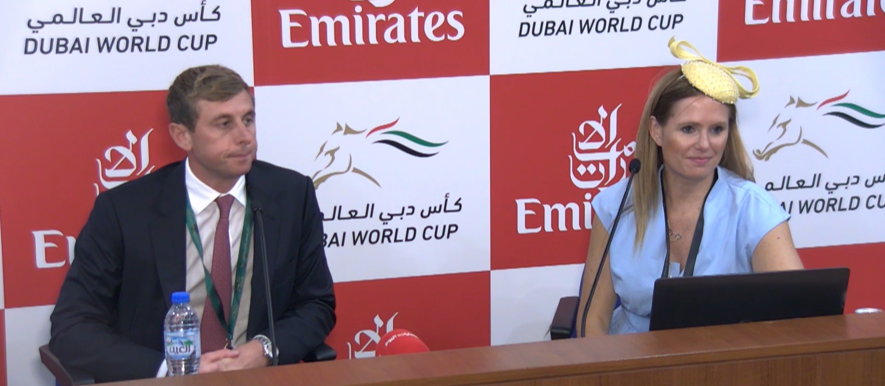 Two people at a press conference